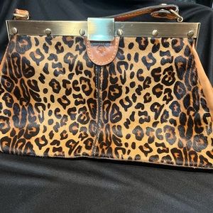 Patricia Nash leopard satchel.